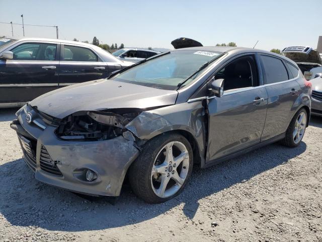 FORD FOCUS TITANIUM 2014 with VIN 1FADP3N26EL413898 - Photo from auction