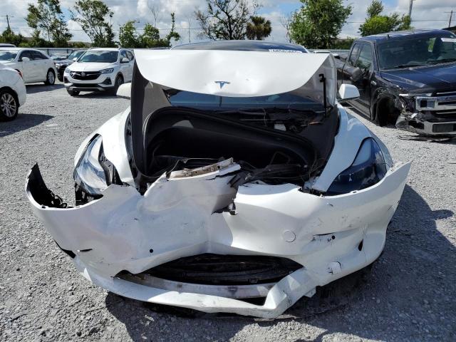 Photo 5 from auction – 2022 TESLA MODEL 3 with VIN 5YJ3E1EB3NF119653