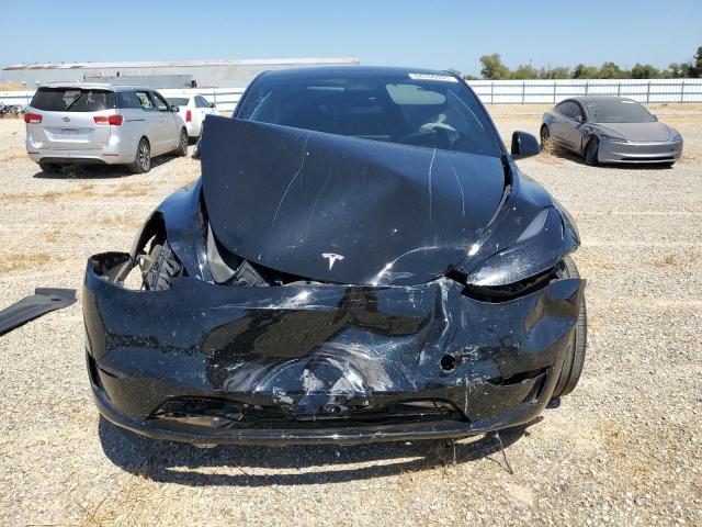 Photo 5 from auction – 2023 TESLA MODEL Y with VIN 7SAYGAEE4PF897802