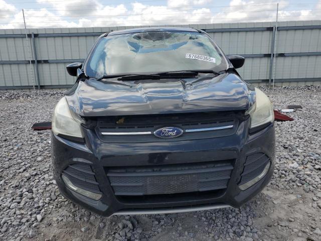 Photo 5 from auction – 2014 FORD ESCAPE SE with VIN 1FMCU9GXXEUE39565