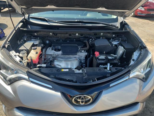 Photo 12 from auction – 2018 TOYOTA RAV4 LE with VIN JTMBFREV9JJ254916