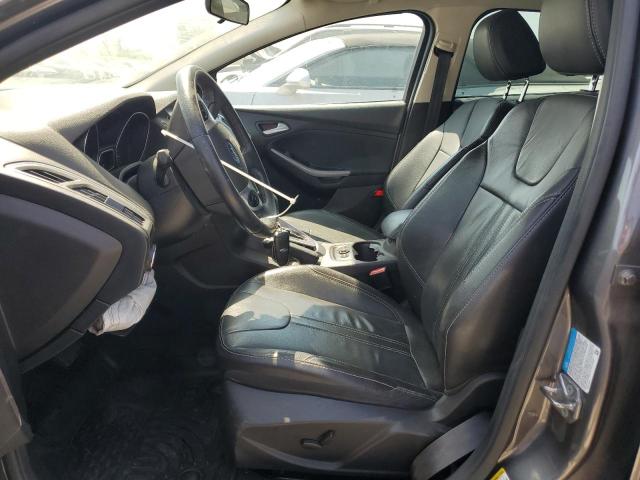 Photo 7 from auction – 2014 FORD FOCUS TITANIUM with VIN 1FADP3N26EL413898