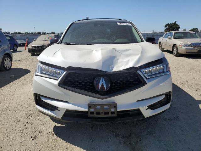 Photo 5 from auction – 2019 ACURA MDX with VIN 5J8YD4H38KL031450