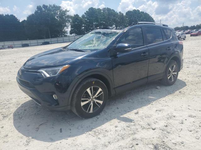TOYOTA RAV4 XLE 2017 with VIN 2T3WFREV0HW334957 - Photo from auction