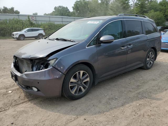 HONDA ODYSSEY TO 2014 with VIN 5FNRL5H93EB094947 - Photo from auction