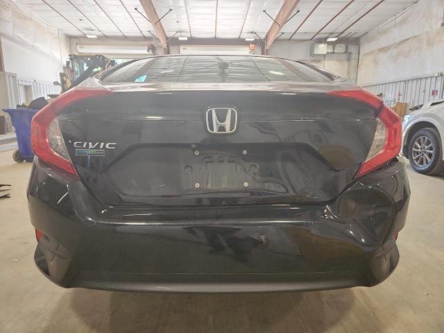 Photo 6 from auction – 2017 HONDA CIVIC LX with VIN 19XFC2F59HE007869