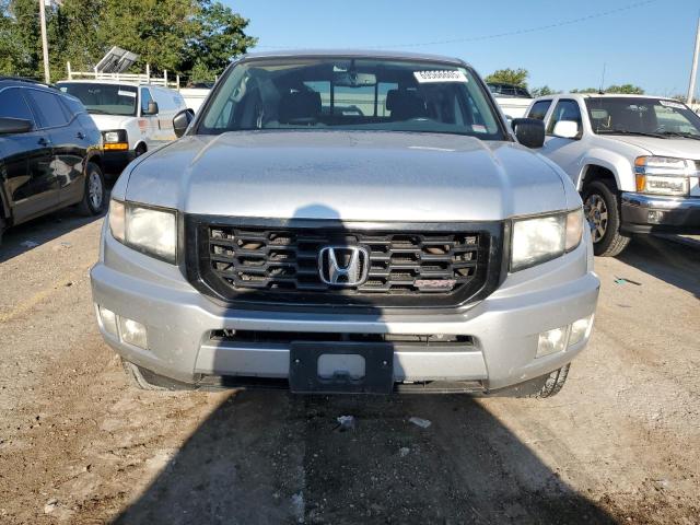 Photo 5 from auction – 2013 HONDA RIDGELINE with VIN 5FPYK1F79DB011357