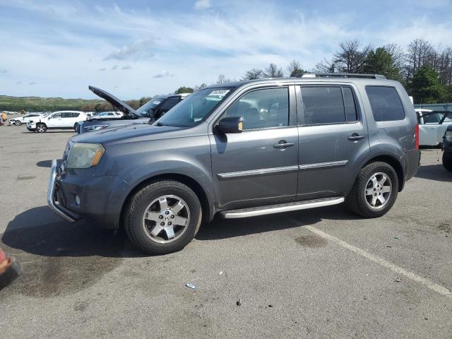 HONDA PILOT TOUR 2011 с VIN 5FNYF4H95BB061263 - Фото с аукциона
