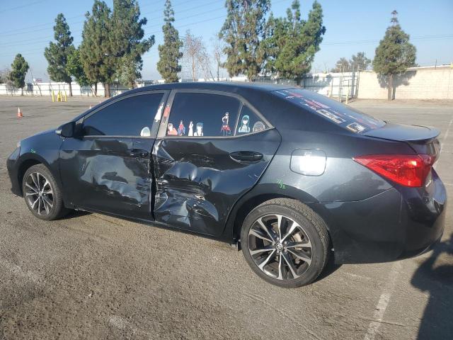 Photo 2 from auction – 2018 TOYOTA COROLLA L with VIN 5YFBURHE6JP848831
