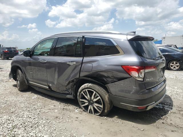 Photo 2 from auction – 2021 HONDA PILOT TOURING with VIN 5FNYF5H95MB011570