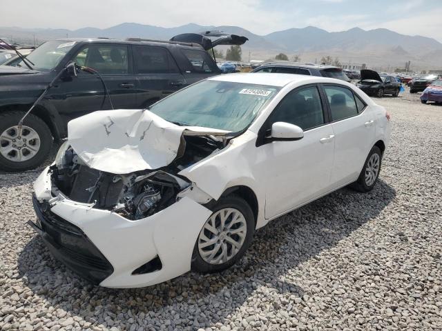 TOYOTA COROLLA L 2018 with VIN 5YFBURHE1JP829393 - Photo from auction