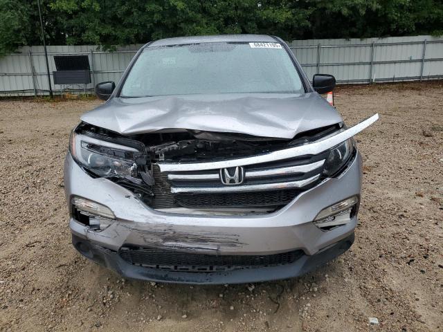 Photo 5 from auction – 2018 HONDA PILOT LX with VIN 5FNYF5H15JB027337