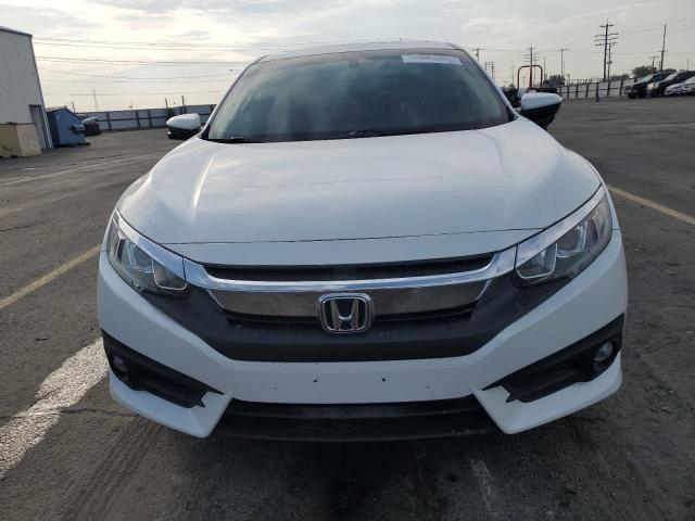 Photo 5 from auction – 2018 HONDA CIVIC EX with VIN JHMFC1F34JX002656