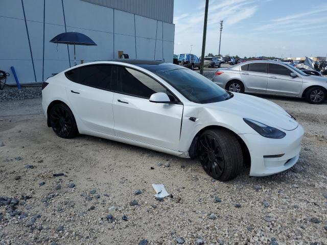 Photo 4 from auction – 2022 TESLA MODEL 3 with VIN 5YJ3E1EC9NF248506