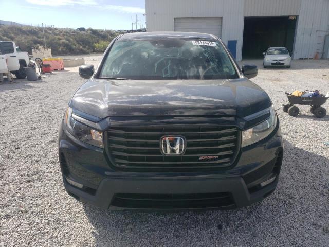 Photo 5 from auction – 2023 HONDA RIDGELINE with VIN 5FPYK3F12PB049170