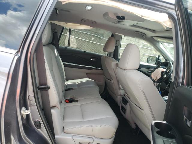 Photo 10 from auction – 2021 HONDA PILOT TOURING with VIN 5FNYF5H95MB011570