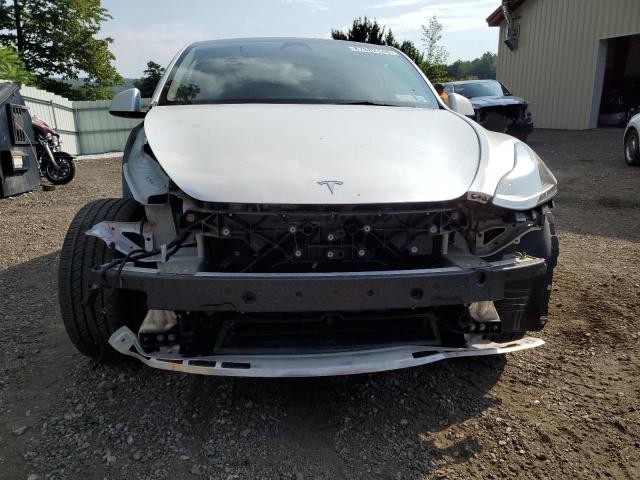 Photo 5 from auction – 2023 TESLA MODEL Y with VIN 7SAYGDEE1PF764576