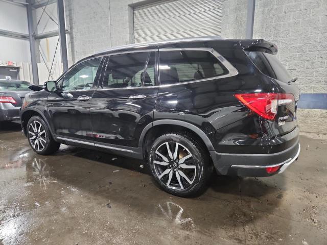 Photo 2 from auction – 2021 HONDA PILOT ELIT with VIN 5FNYF6H07MB051981