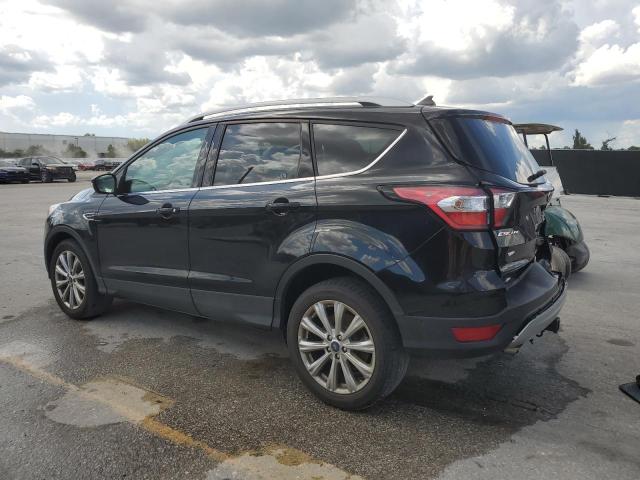 Photo 2 from auction – 2018 FORD ESCAPE TIT with VIN 1FMCU0J91JUD26359