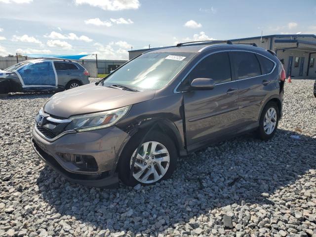 HONDA CR-V EXL 2015 with VIN 2HKRM4H70FH646817 - Photo from auction