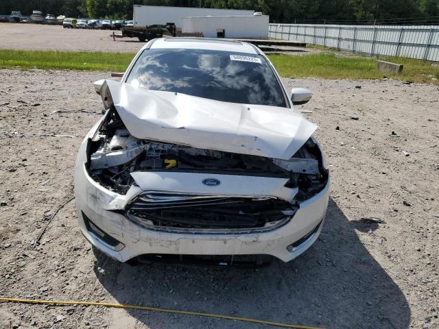 Photo 5 from auction – 2016 FORD FOCUS TITA with VIN 1FADP3J25GL236365