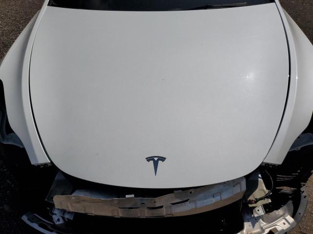 Photo 12 from auction – 2021 TESLA MODEL Y with VIN 5YJYGDEE2MF286466