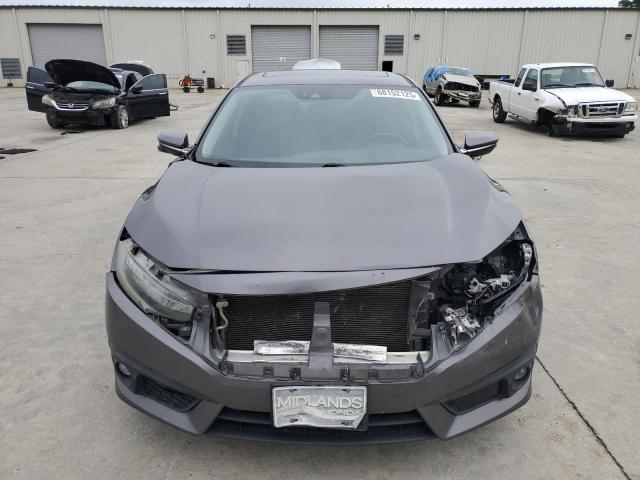 Photo 5 from auction – 2017 HONDA CIVIC TOURING with VIN 2HGFC1F99HH657918