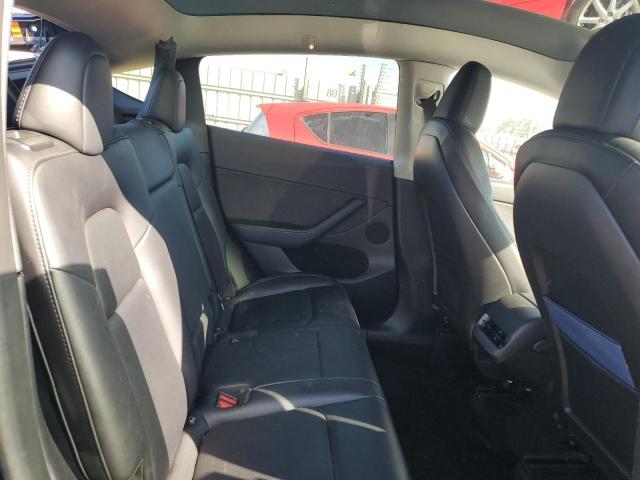Photo 11 from auction – 2022 TESLA MODEL Y with VIN 7SAYGDEE5NF576074