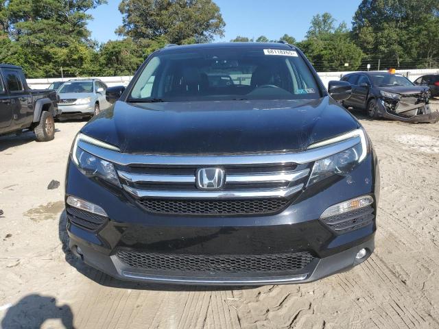 Photo 5 from auction – 2016 HONDA PILOT ELIT with VIN 5FNYF6H04GB071643