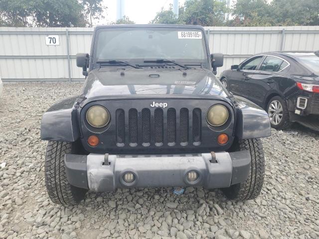 Photo 5 from auction – 2011 JEEP WRANGLER SAHARA with VIN 1J4AA5D19BL638812