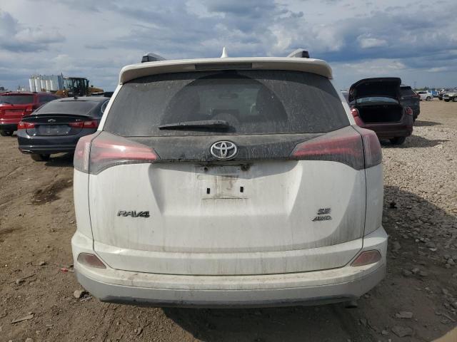 Photo 6 from auction – 2016 TOYOTA RAV4 SE with VIN JTMJFREV6GJ070960
