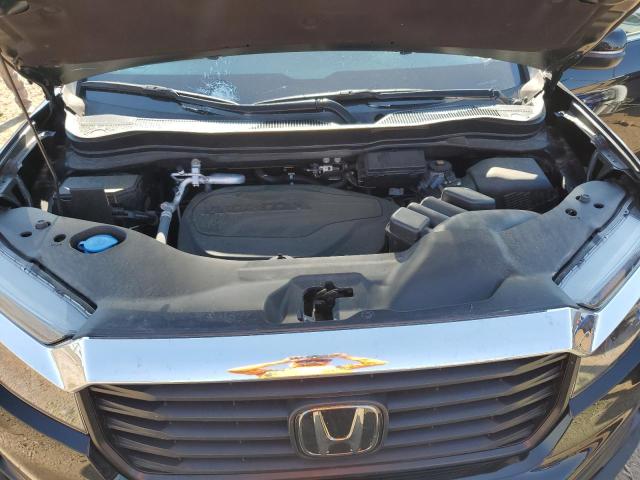 Photo 11 from auction – 2023 HONDA RIDGELINE with VIN 5FPYK3F52PB015913