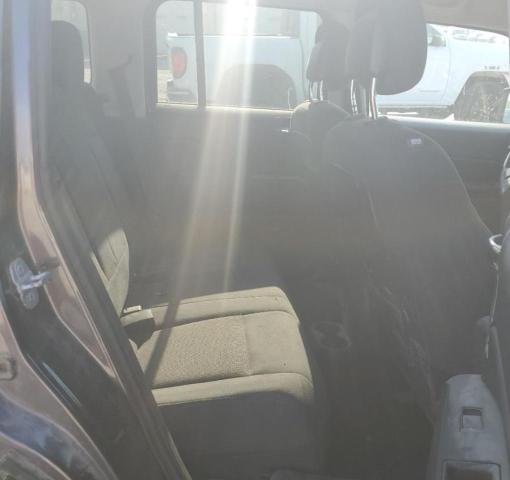 Photo 10 from auction – 2014 JEEP PATRIOT SP with VIN 1C4NJRBB1ED908320