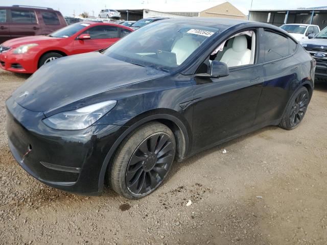 TESLA MODEL Y 2023 with VIN 7SAYGDEF3PF617507 - Photo from auction