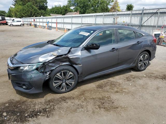 HONDA CIVIC EX 2018 with VIN JHMFC1F39JX017587 - Photo from auction