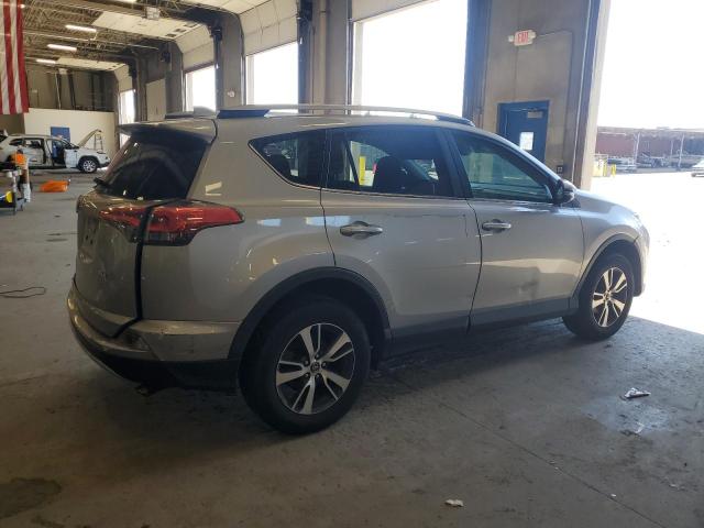 Photo 3 from auction – 2018 TOYOTA RAV4 LE with VIN 2T3WFREV1JW491466