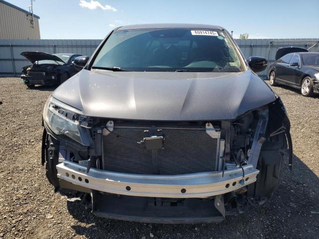 Photo 5 from auction – 2021 HONDA PASSPORT E with VIN 5FNYF8H5XMB007741