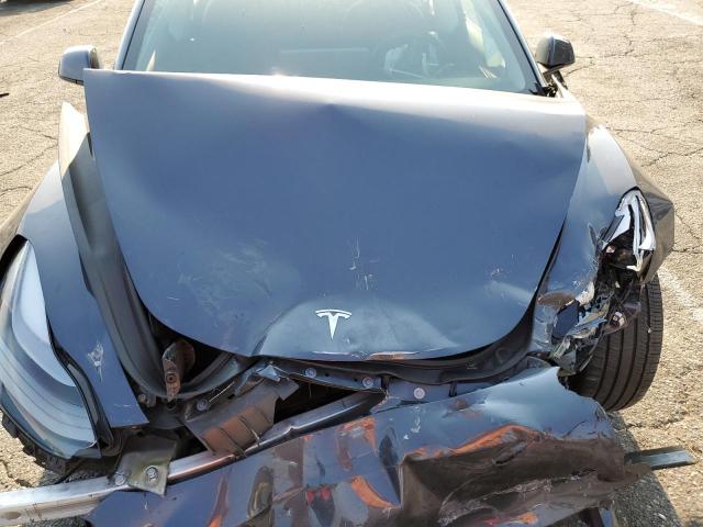 Photo 11 from auction – 2023 TESLA MODEL 3 with VIN 5YJ3E1EA4PF710861