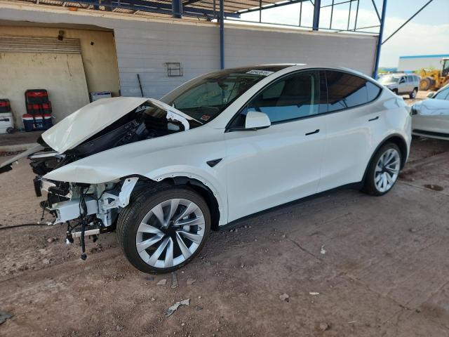 TESLA MODEL Y 2026 with VIN 7SAYGDEE3TF329732 - Photo from auction