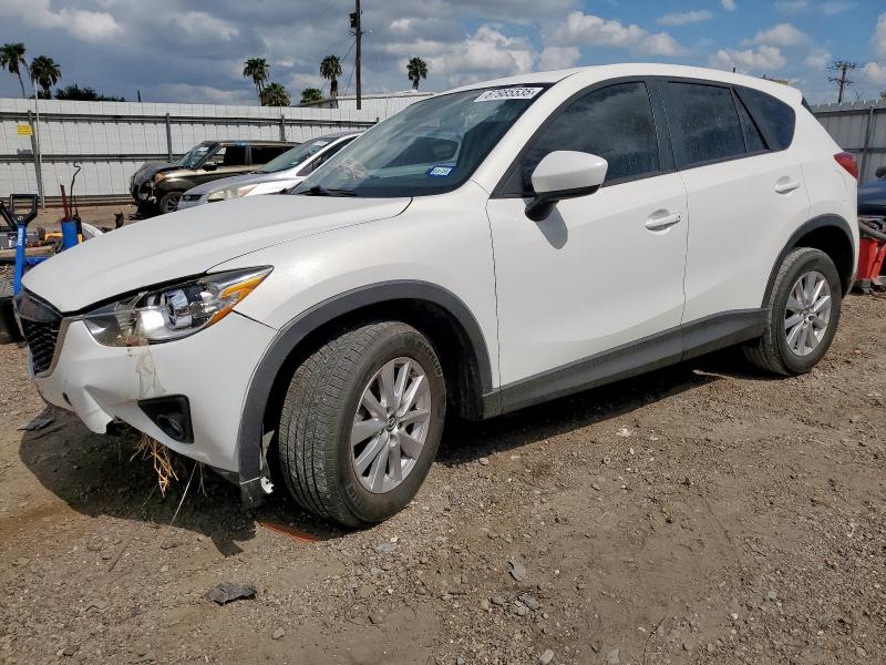 MAZDA CX-5 TOURING 2014 with VIN JM3KE2CY6E0420884 - Photo from auction
