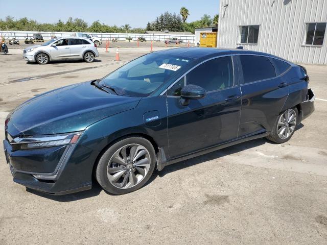 HONDA CLARITY 2018 with VIN JHMZC5F11JC023099 - Photo from auction