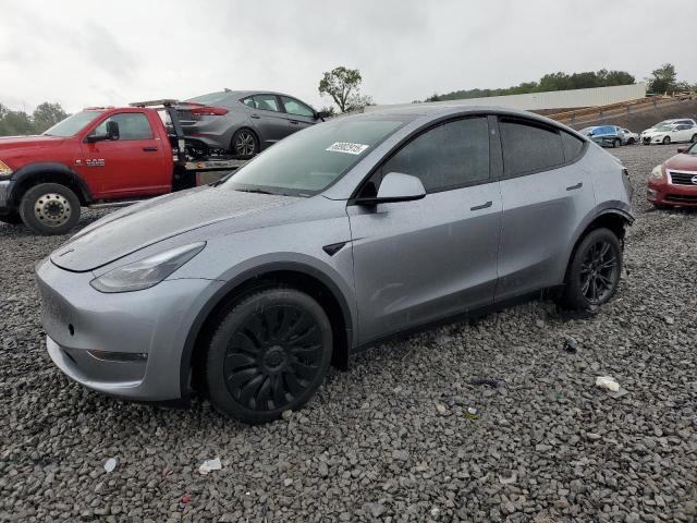 TESLA MODEL Y 2024 with VIN 7SAYGDEE8RA329327 - Photo from auction