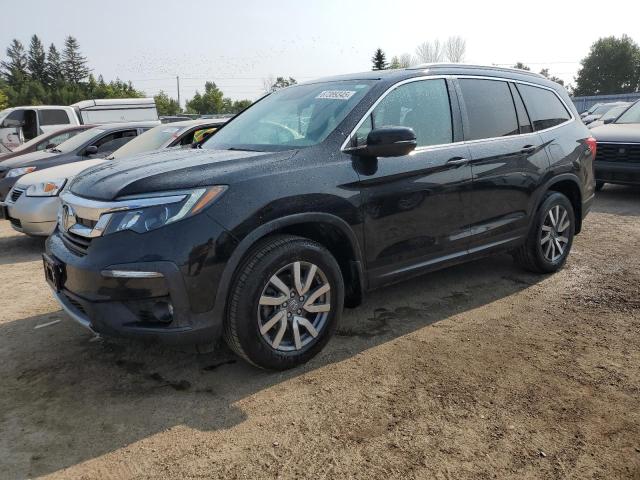 HONDA PILOT BLAC 2021 with VIN 5FNYF6H76MB500564 - Photo from auction