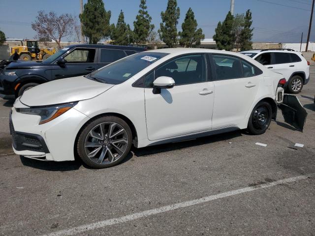 TOYOTA COROLLA SE 2021 with VIN 5YFS4MCEXMP097120 - Photo from auction