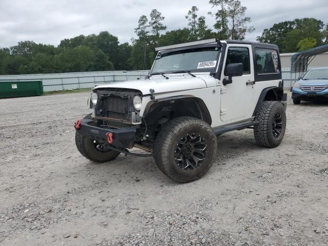 JEEP WRANGLER S 2013 with VIN 1C4AJWAG2DL512251 - Photo from auction