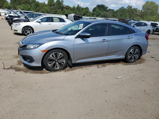 HONDA CIVIC EX 2017 with VIN 19XFC1F35HE013516 - Photo from auction