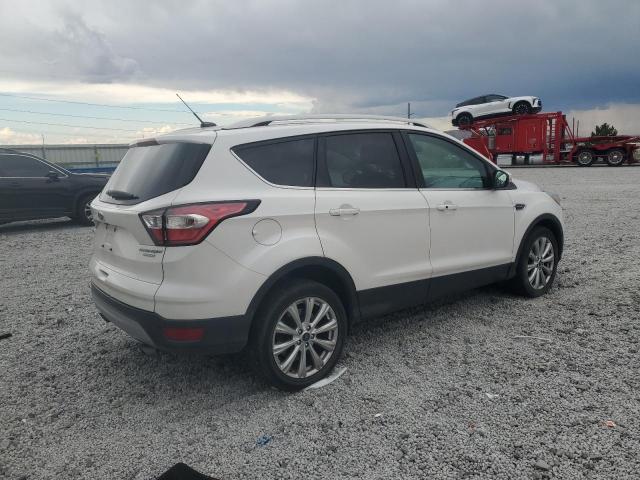 Photo 3 from auction – 2017 FORD ESCAPE TITANIUM with VIN 1FMCU0J96HUB81328
