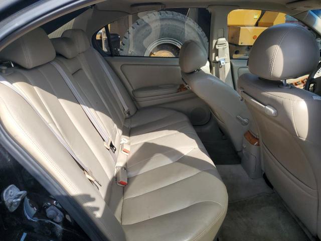 Photo 10 from auction – 2002 INFINITI I35 with VIN JNKDA31A12T029708
