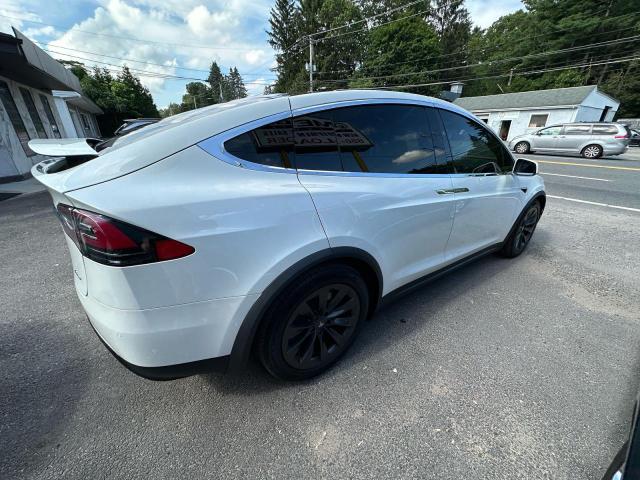 Photo 4 from auction – 2018 TESLA MODEL X with VIN 5YJXCDE27JF136930