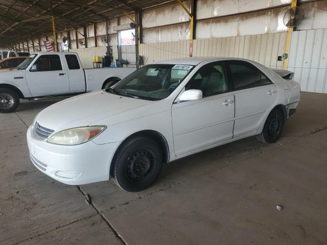 TOYOTA CAMRY LE 2002 with VIN 4T1BE32K12U091975 - Photo from auction